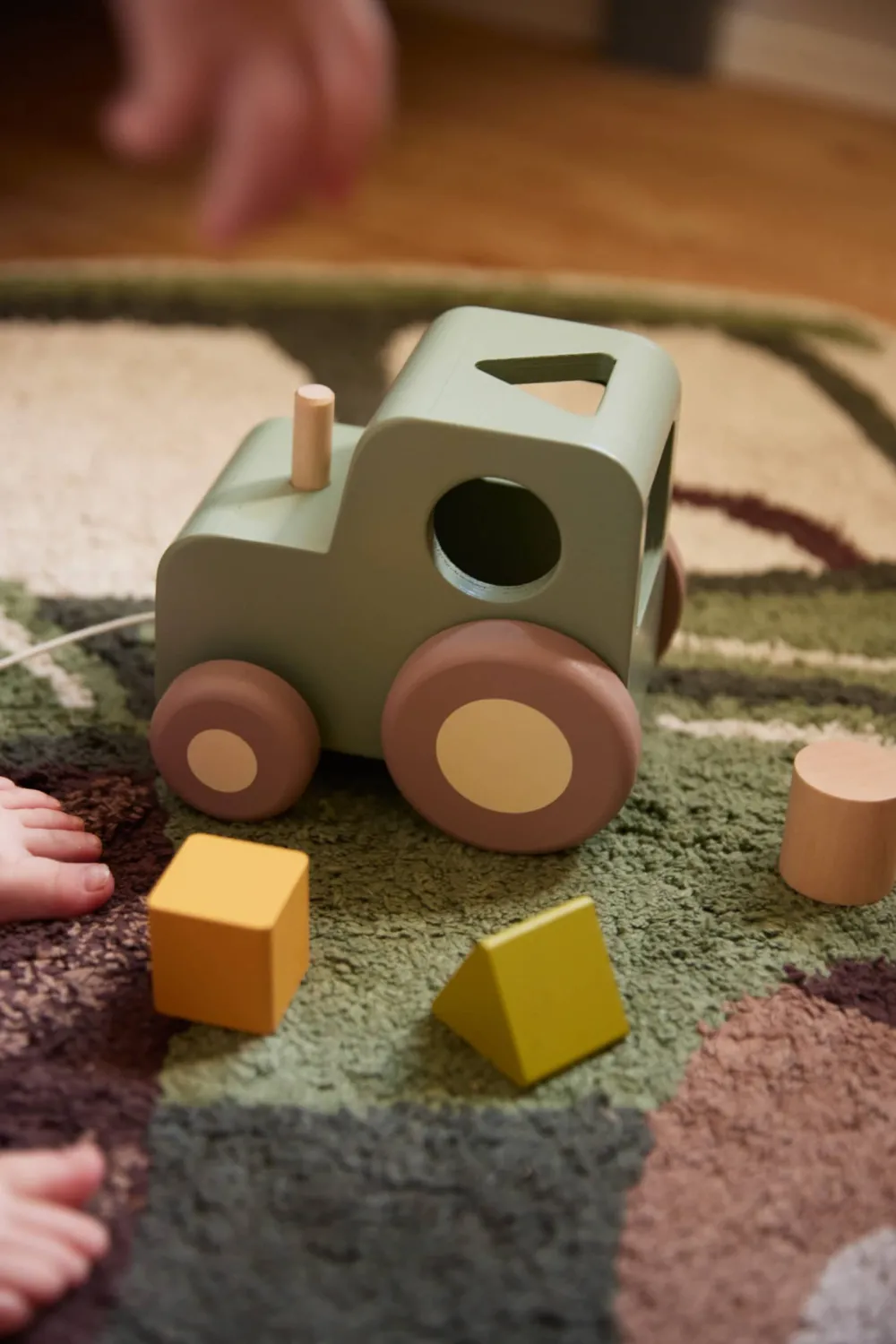 pull_along_tractor_with_s_2.webp Kids FILIBABBA Wooden Toys>Pull along tractor with shape sorter –